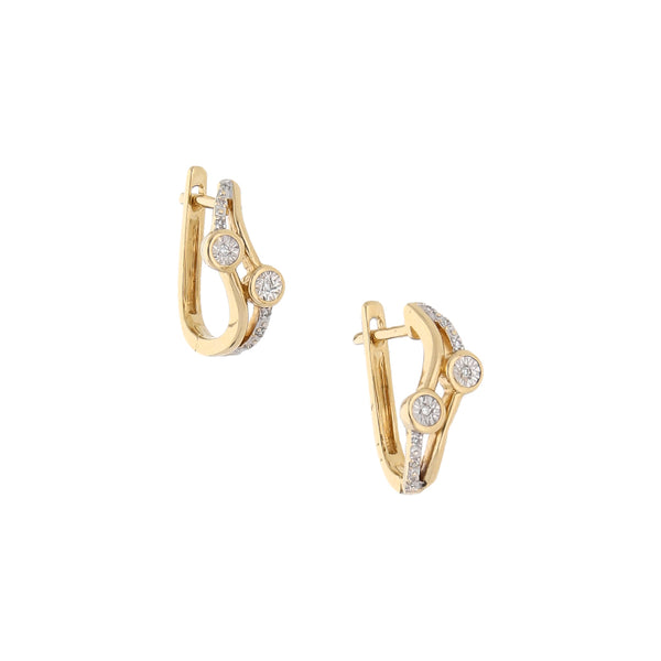 Aretes estilizados con diamante en oro amarillo 14 kilates.