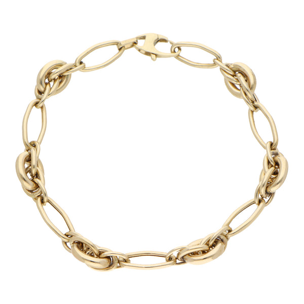 Pulsera eslabón combinado en oro amarillo 14 kilates.